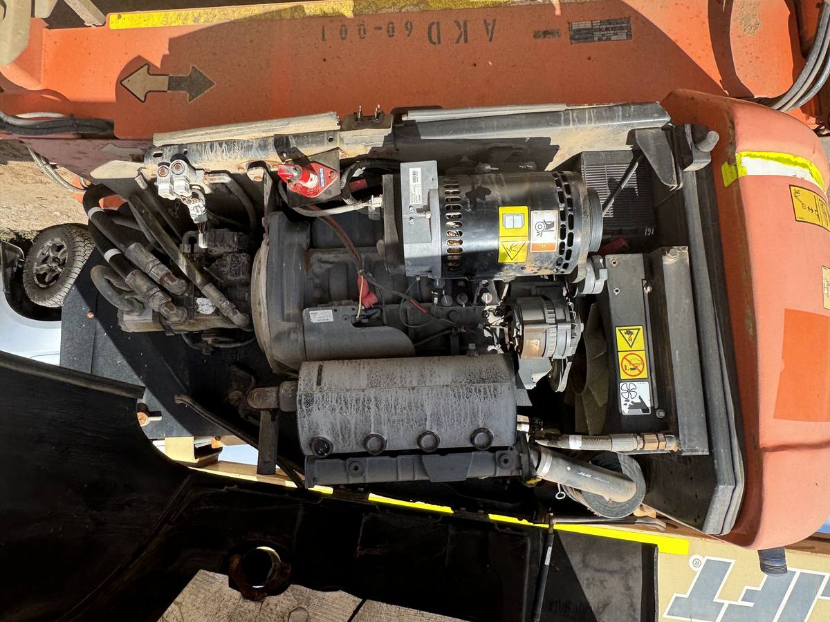 Boom lift engine bay opened for service