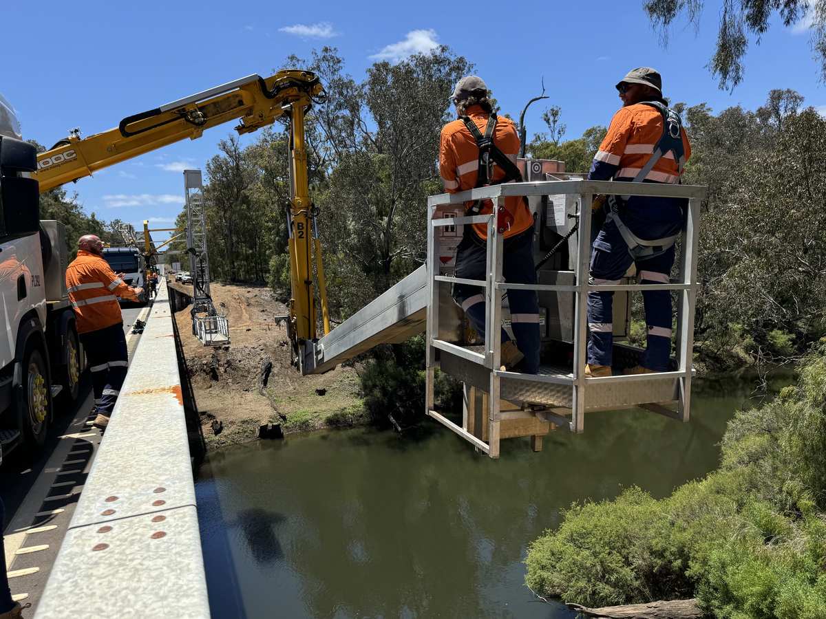 APS crew on an under bridge inspection unit